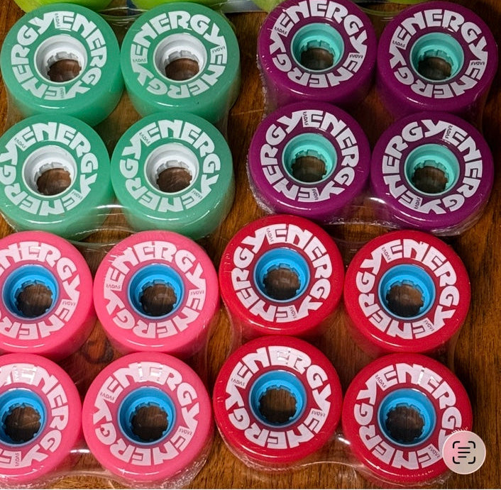 Radar Energy 57 outdoor roller skate wheels in aqua, purple, pink, and red